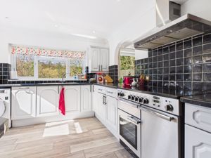 Kitchen with open hatch to dining area - click for photo gallery